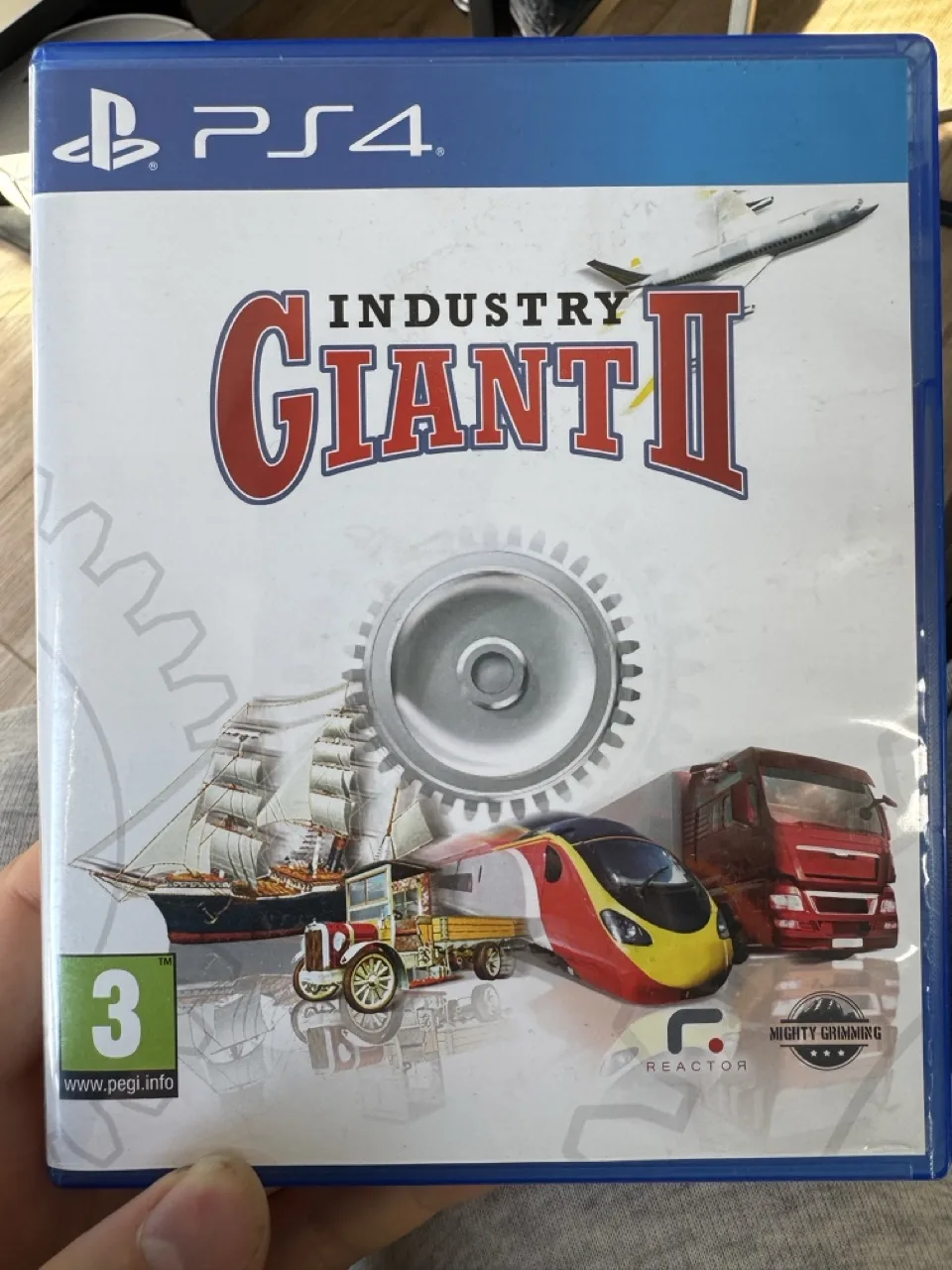 Industry Giant II (PS4) okładka wydania pudełkowego, wersja EU, zdjęcie 1